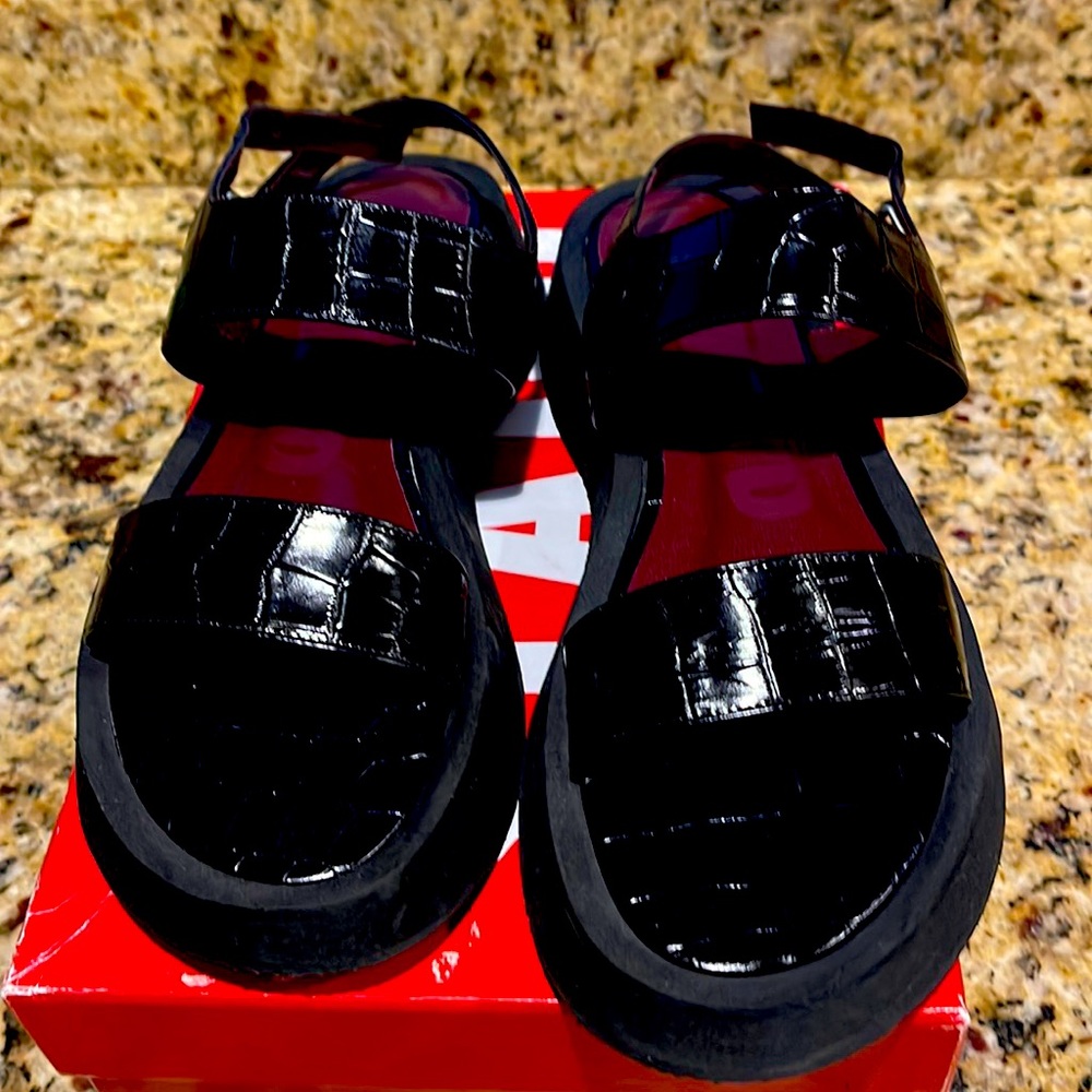 Brand new black sandals. Staud brand. Too small and I can’t return them.